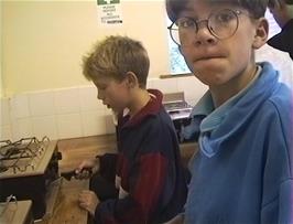 Daniel and Tristan prepare breakfast at Sheringham youth hostel